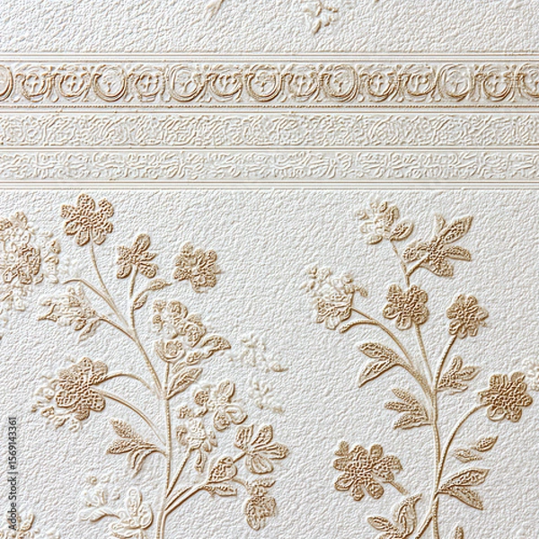Fototapeta A wall with a floral design and a white border
