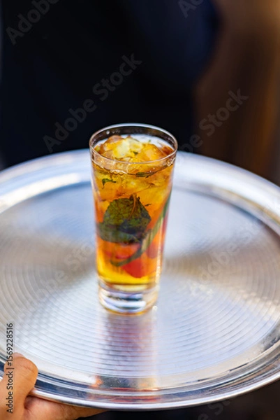Fototapeta Mint Cocktail with Ice Served on Silver Tray