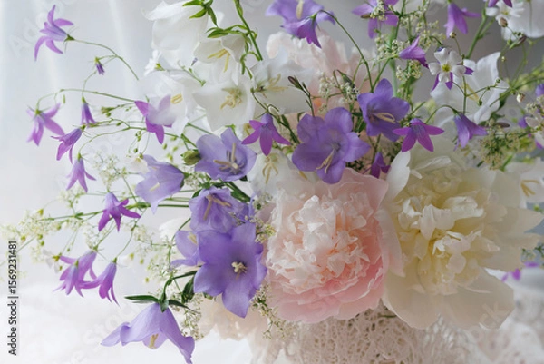 Obraz Bouquet of flowers peonies, white and blue bells, gypsophila, fragment, close-up, beautiful postcard