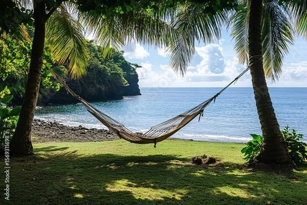 Fototapeta Hammock Under Palm Trees with Open View to the Sea