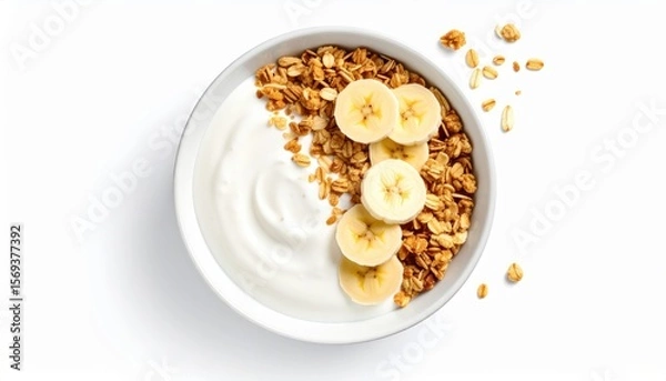 Fototapeta Yogurt with Granola and Banana: A healthy and delicious breakfast or snack, featuring creamy yogurt topped with crunchy granola and fresh banana slices.