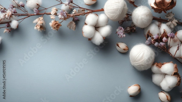 Obraz Top view composition of soft cotton baby balls paired with cotton flowers