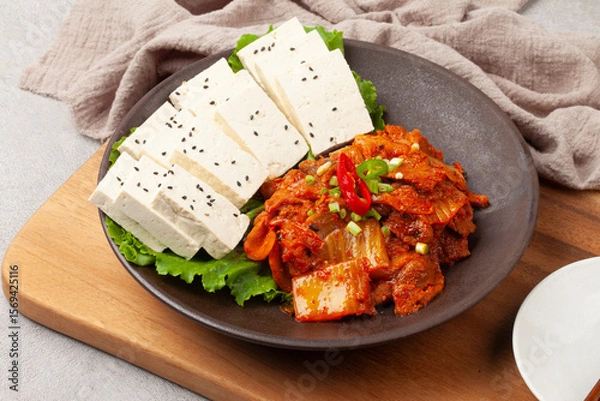 Fototapeta Tofu kimchi is a dish made by boiling tofu and eating it with stir-fried kimchi.
