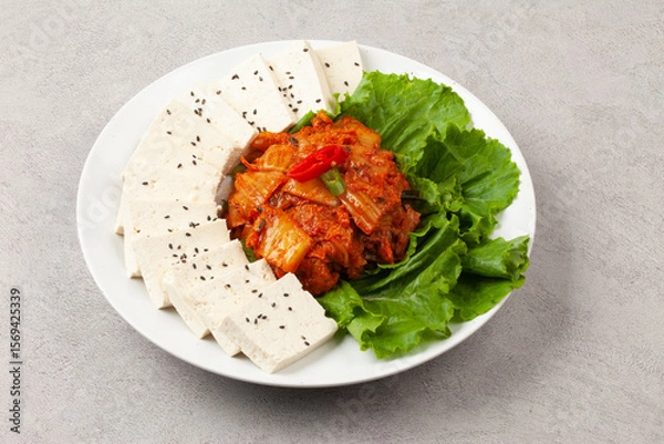 Fototapeta Tofu kimchi is a dish made by boiling tofu and eating it with stir-fried kimchi.