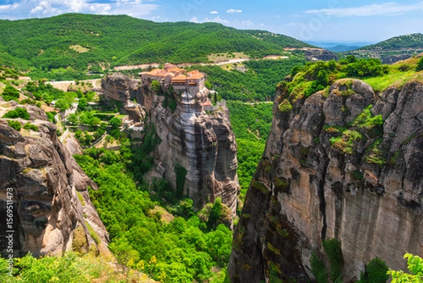 Fototapeta Ancient Greek monastery dramatically perched on cliffs in Meteora Greece