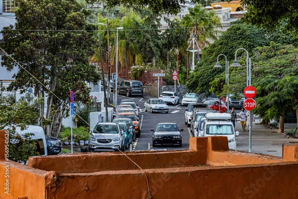Obraz Cars drive along a road on the island of Tenerife on a summer evening	
