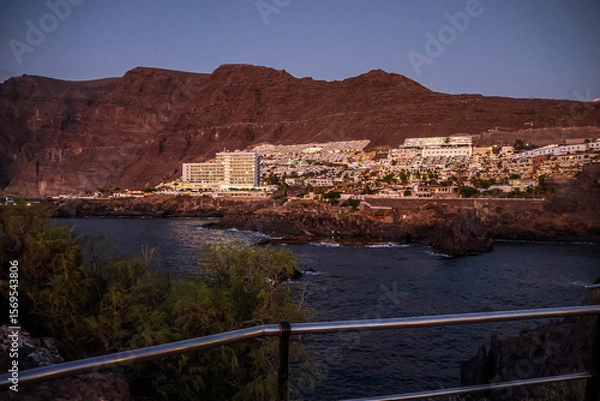 Obraz Silhouette of a mountain on the horizon at sunset on the Atlantic Ocean coast near Tenerife island	
