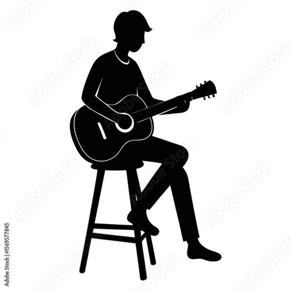 Fototapeta Silhouette of a person playing an acoustic guitar while sitting on a stool