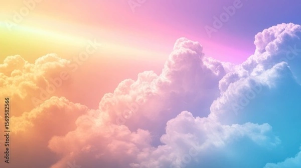 Fototapeta Dreamy pastel skies with fluffy clouds and a luminous rainbow horizon glow