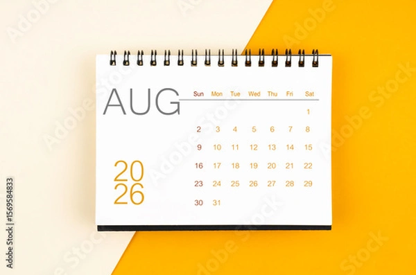 Fototapeta Desk calendar for August 2026 year on yellow color background, Flat lay.