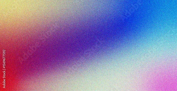 Obraz Abstract vibrant gradient background featuring smooth transitions between yellow, red, blue, and pink tones with a grainy noise texture. 