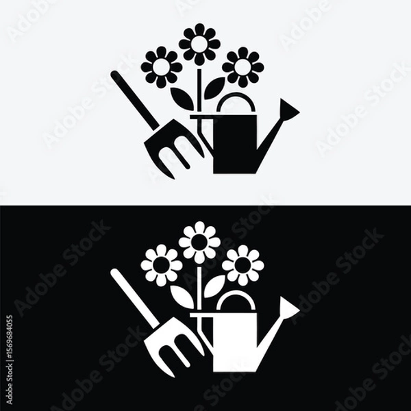 Fototapeta Watering can with flowers and pitchfork isolated on white background