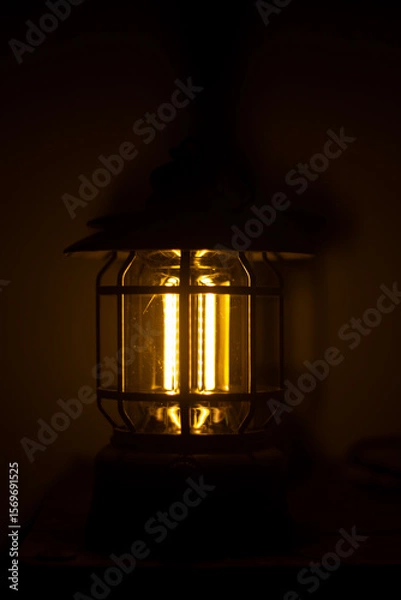 Fototapeta Warm light lantern for indoor use and in the dark