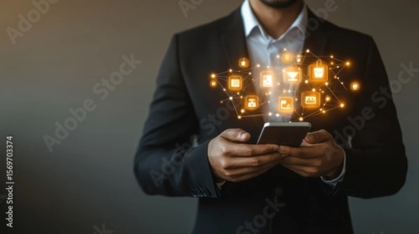 Fototapeta Businessman using phone with digital icons. Mobile commerce
