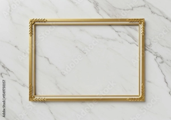 Fototapeta A rectangular golden picture frame with a simple border, empty and resting on a white marble surface.