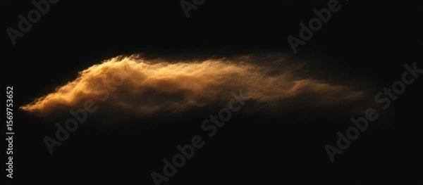 Fototapeta Golden cloud illuminates the night sky, creating an atmospheric and captivating spectacle