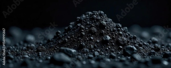 Obraz Raw Lignite Coal Close-up Texture of Dark Fossil Fuel against Black Background. Evokes Energy, Power, and Earths Resources.