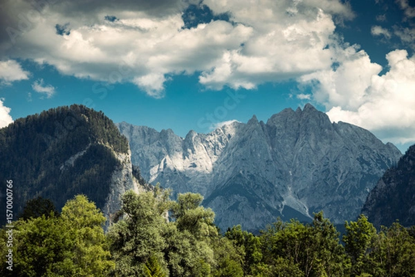 Obraz Mountains panorama detail from Admont with dramatic clouds on sky and trees on foreground, Kreuzkogel, Riffel, Rosskopf, Kalbling mountains, Austria