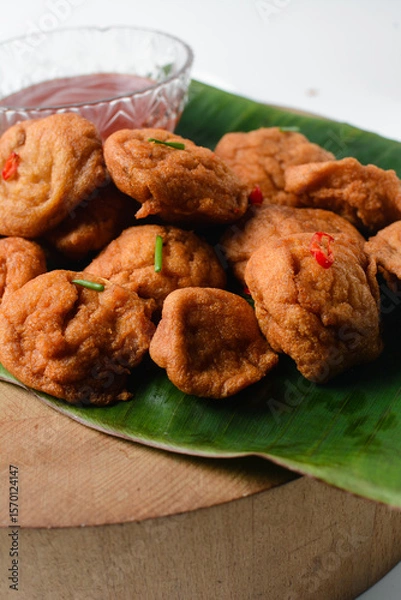 Obraz Overhead view of Akara on plantain leaf, top view of nigerian akara fried beans cake