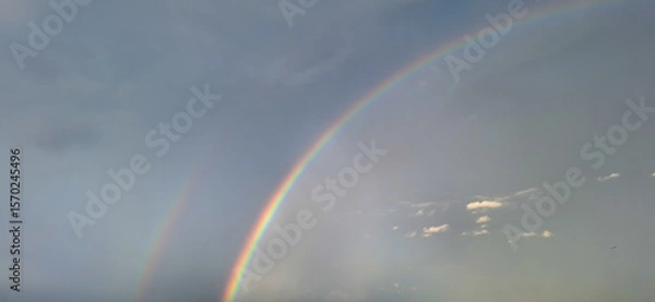 Fototapeta Natural Rainbow in the Sky After Rain – Soft Light and Cloudscape