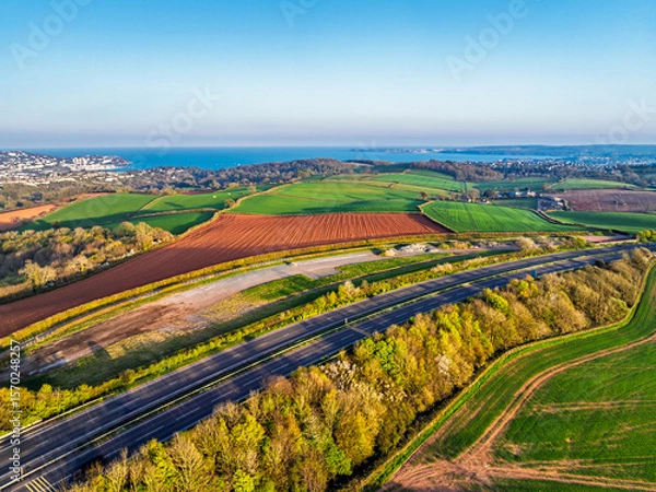 Fototapeta Farms and Fields over Torquay from a drone, Devon, England