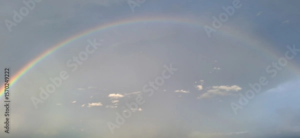 Fototapeta Natural Rainbow in the Sky After Rain – Soft Light and Cloudscape