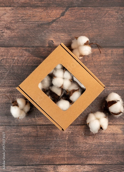 Fototapeta Decorative artificial cotton in a craft box, perfect for handmade decor and gift wrapping. Natural autumn tones for cozy seasonal designs