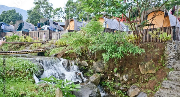 Fototapeta tropical riverside camping view, puncak mas, west java, indonesia

