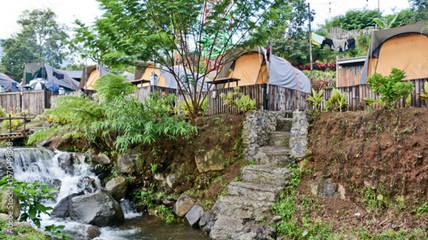 Fototapeta tropical riverside camping view, puncak mas, west java, indonesia
