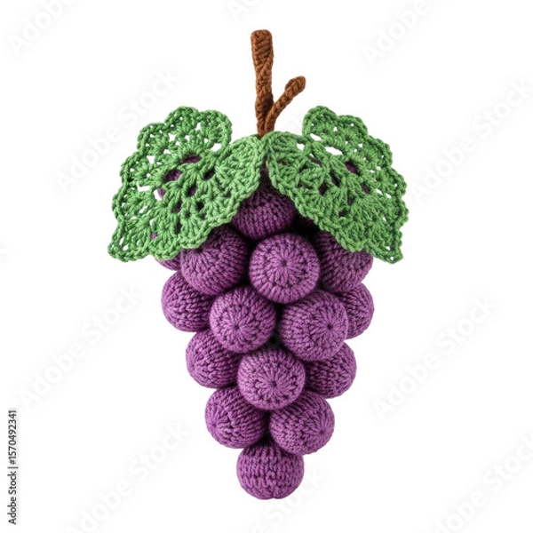 Fototapeta A charming handmade crocheted purple grape bunch featuring detailed green leaves and a brown stem, perfect for craft projects or decorative use.