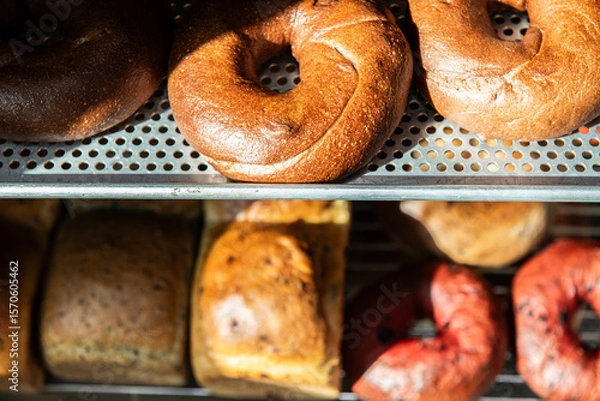 Fototapeta Freshly Baked Bagels on Bakery Shelves