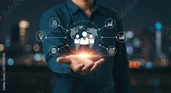 Fototapeta Man holding a glowing digital network of global business connections and icons representing strategy and growth