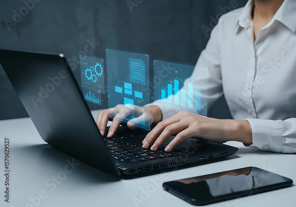 Fototapeta Businesswoman Analyzing Data with Holographic Interface on Laptop Modern Technology and Data Visualization for Business Decisions