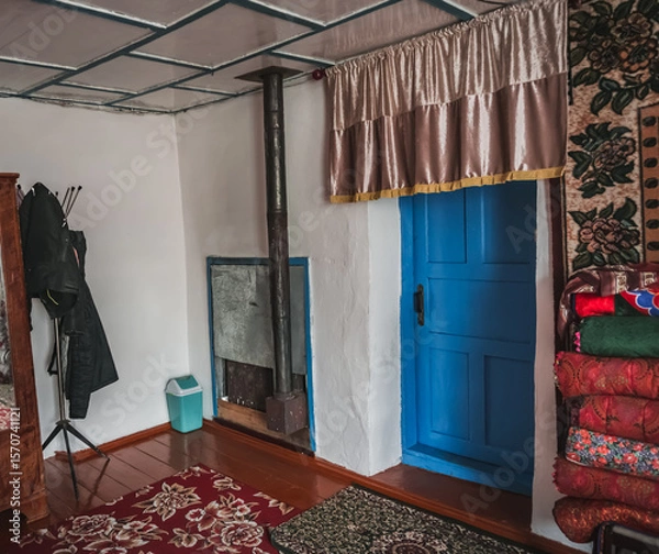 Fototapeta Traditional interior in the house of the Pamir population of the Pamirs in the village of Karakul, a highland settlement