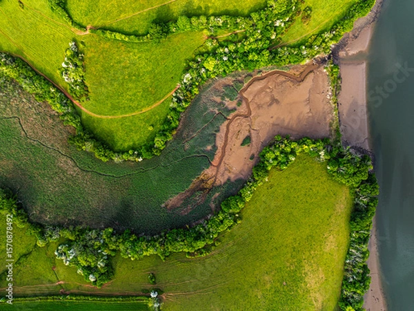 Fototapeta Top Down over Marshes over River Dart from a drone, Stoke Gabriel, Totnes, Devon, England, Europe