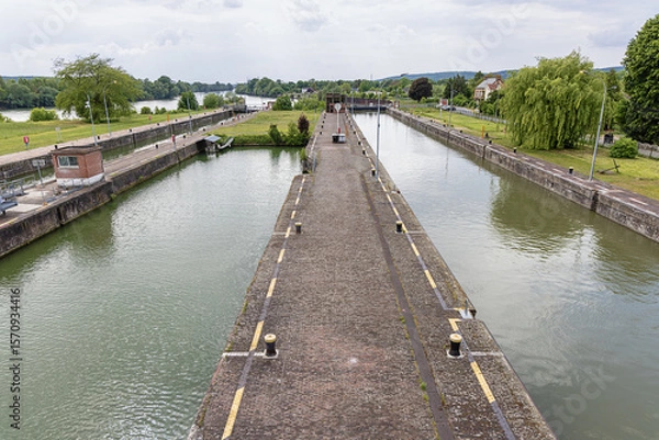 Fototapeta The locks of Amfreville-sous-les-Monts seen from the overpass on the Seine near Rouen