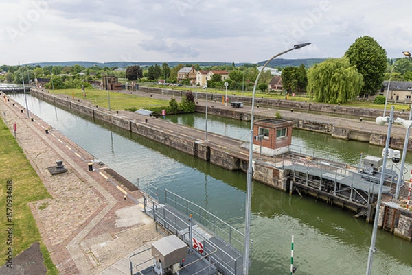 Fototapeta The lagre and the small lock of Amfreville-sous-les-Monts seen from the overpass on the Seine near Rouen