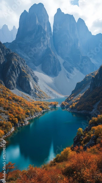 Fototapeta Pyrenees Lakes in Autumn France Spain Jagged Peaks Cradle Lakes Glowing with Fall Colors and Soft Mountains
