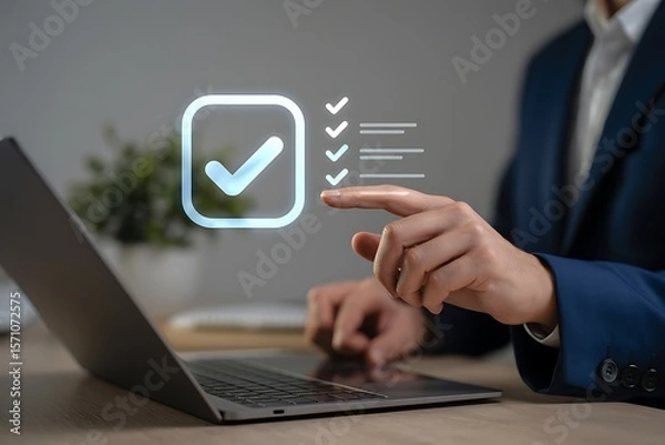 Fototapeta Businessman checking off tasks on a digital checklist