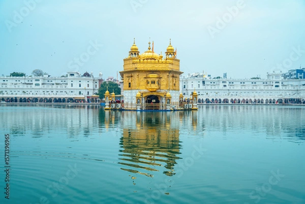 Fototapeta Golden Temple (Harmandir Sahib) in Amritsar, India. Sacred Sikh shrine covered in gold, surrounded by the holy Sarovar and known for its spiritual serenity.