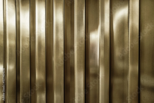 Obraz Abstract Background of a Blurred Brass Wall Panel.