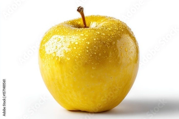 Obraz Studio shot showcasing a vibrant yellow apple, adorned with water droplets, presented against a