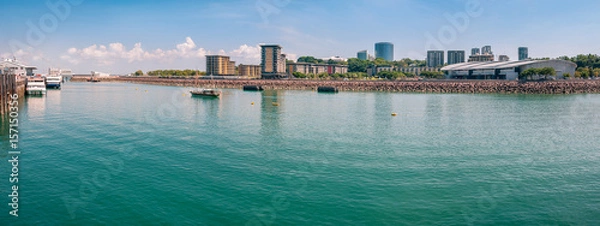 Obraz The Darwin waterfront is a popular place for restaurants, shops, water sports, and cruise ships in the capital city of the Northern Territory, Australia.