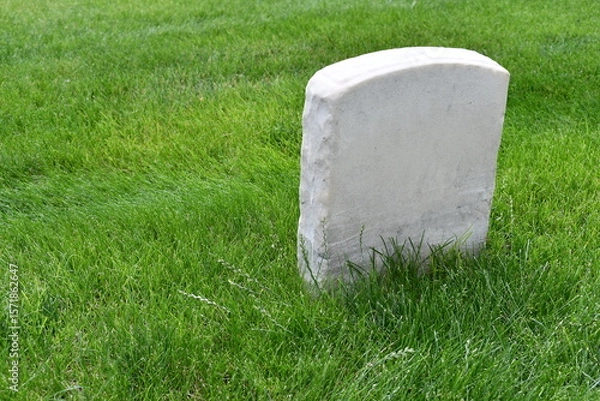 Obraz Unmarked grave. Small headstone, granite.