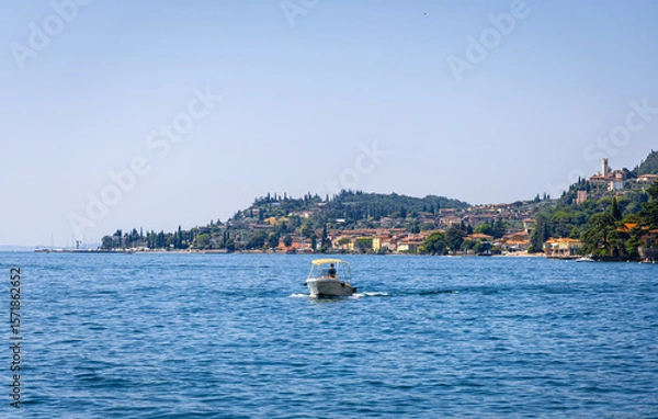 Fototapeta View of Gargnano signpost by Lake Garda, Italy; ideal for travel and destination visuals.