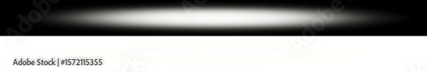 Fototapeta Spotlight glow effect with top black background and bottom transparent background
