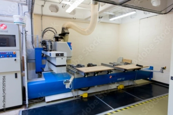 Obraz 3D render showing blue CNC milling machine is working in workshop with dust hose, control console