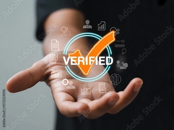 Obraz Orange checkmark verified symbol with surrounding icons displayed over an open hand verification approval