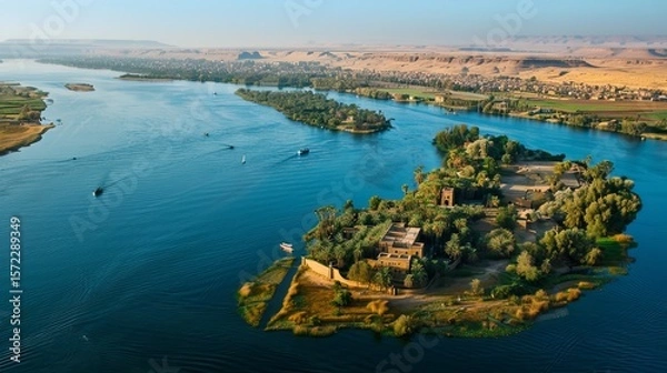 Obraz The Nile River is a major waterway that flows through Egypt, providing water and nourishment to the surrounding land. It is located near the city of Luxor, a popular tourist destination.