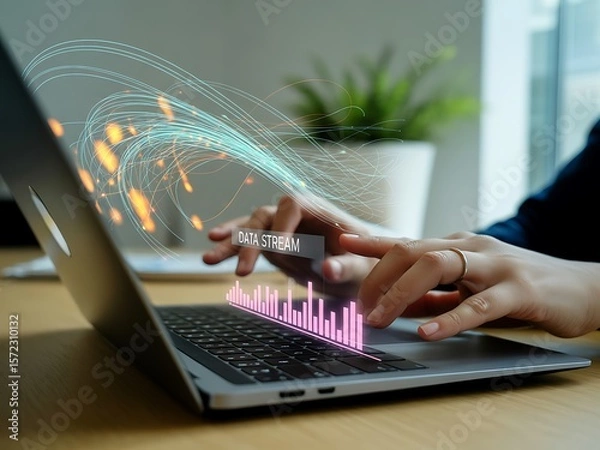 Obraz Person using laptop with glowing data stream and bar graph visualization technology